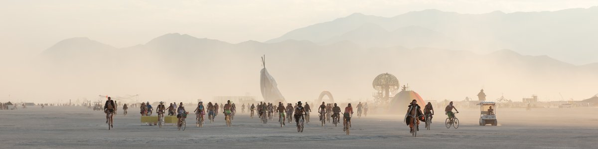 A group of burners riding their bikes.