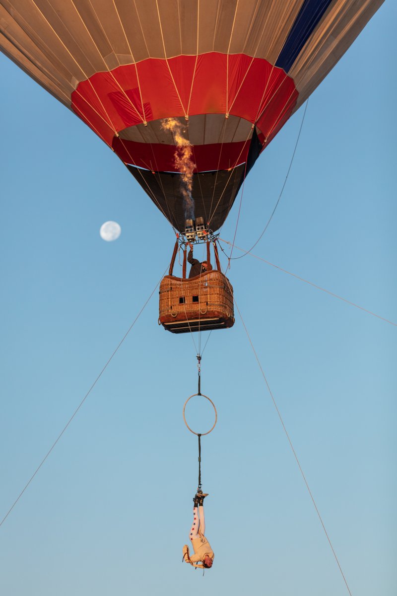 Strait No Chaser : The Great Strait Escape by: LadyBEAST and GatorDox from: Oakland, CA year: 2018 Strait No Chaser : The Great Strait Escape is a performance art installation in which Arianna (LadyBEAST) will be secured in a strait jacket and suspended by her feet from the basket of a hot air balloon. The piece is supported by a team from GatorDox camp. It is a radical expression of internal and external struggles gracefully suspended in a chaotic world.