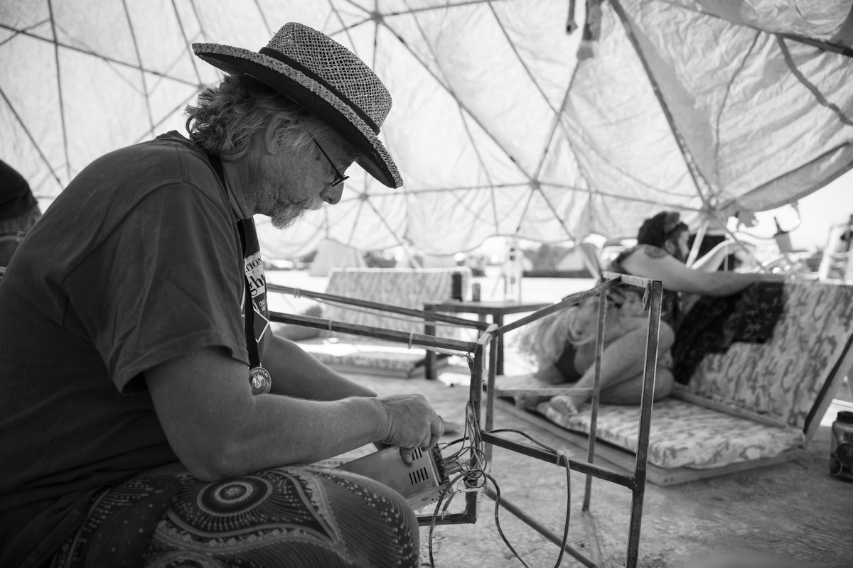 Every time I dropped in on Harold he was always working on something. Legit burner all the way. (The color got all fucked up here so I made this one black and white. We we're inside Camp Awesomesauce's pink dome when I shot this. Hard to get good color inside a completely pink dome!)