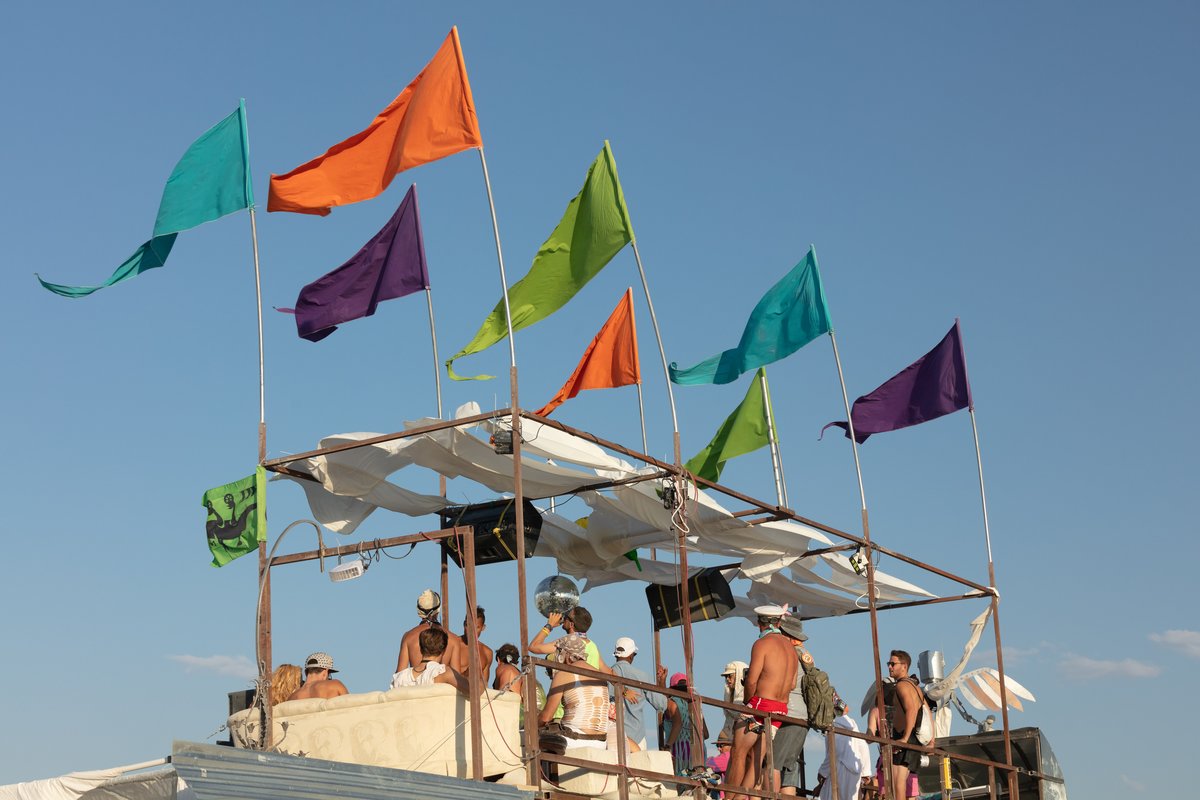 Colorful flags on the Pariah Express by Emmett Moffett and friends.