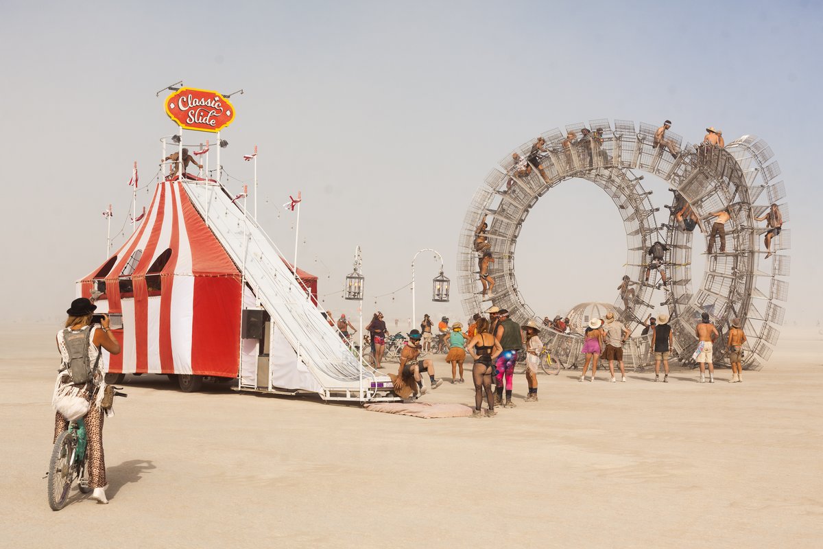Note the guy at the botton of the slide.