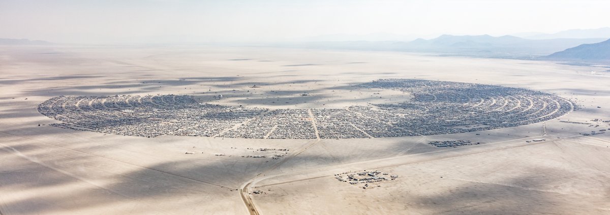 This aerial photograph of Black Rock City was shot on the morning of Friday August 31st, 2018 during Burning Man 2018. The pilot of the aircraft was Purple Haze.
