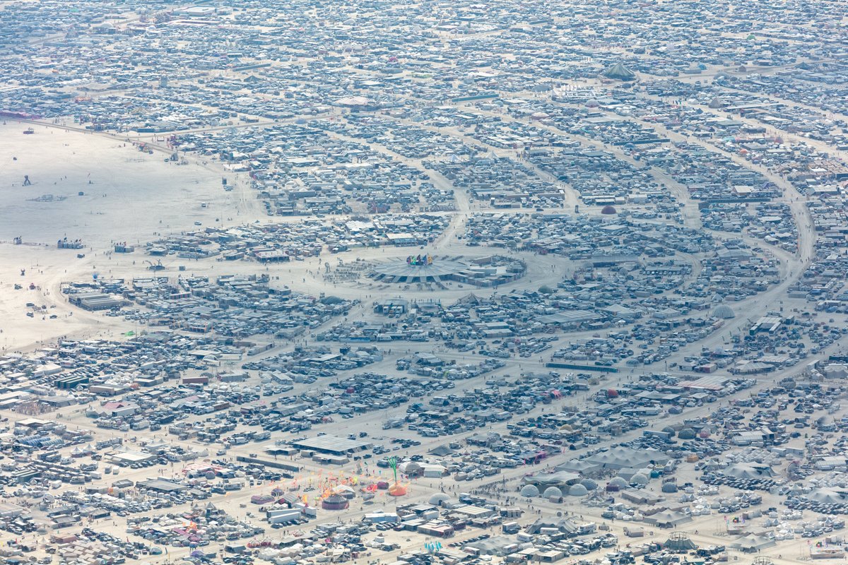 This aerial photograph of Black Rock City was shot on the morning of Friday August 31st, 2018 during Burning Man 2018. The pilot of the aircraft was Purple Haze.