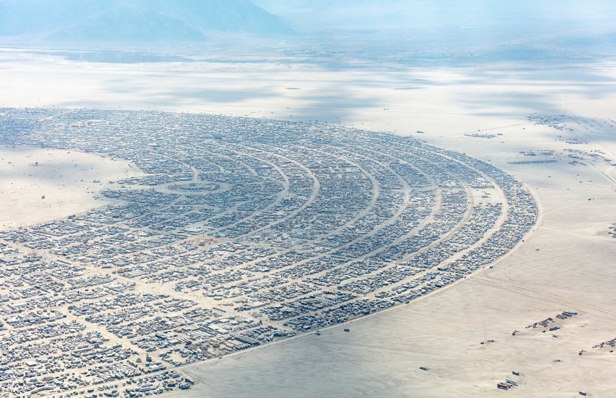This aerial photograph of Black Rock City was shot on the morning of Friday August 31st, 2018 during Burning Man 2018. The pilot of the aircraft was Purple Haze.
