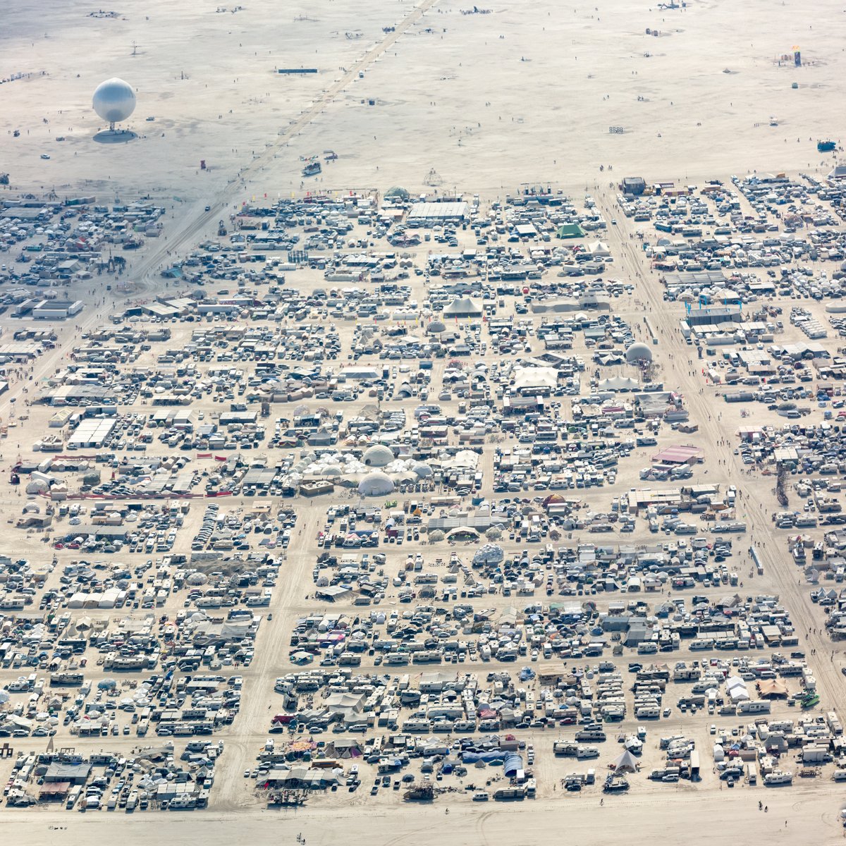 This aerial photograph of Black Rock City was shot on the morning of Friday August 31st, 2018 during Burning Man 2018. The pilot of the aircraft was Purple Haze.