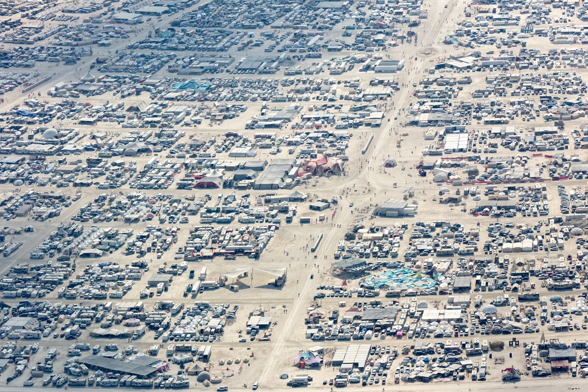 This aerial photograph of Black Rock City was shot on the morning of Friday August 31st, 2018 during Burning Man 2018. The pilot of the aircraft was Purple Haze.
