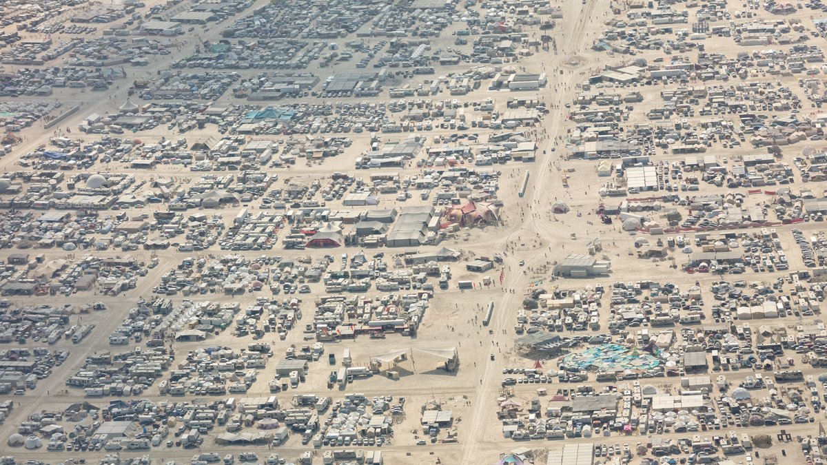 This aerial photograph of Black Rock City was shot on the morning of Friday August 31st, 2018 during Burning Man 2018. The pilot of the aircraft was Purple Haze.