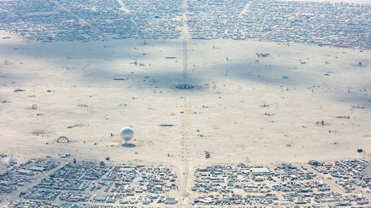 This aerial photograph of Black Rock City was shot on the morning of Friday August 31st, 2018 during Burning Man 2018. The pilot of the aircraft was Purple Haze.