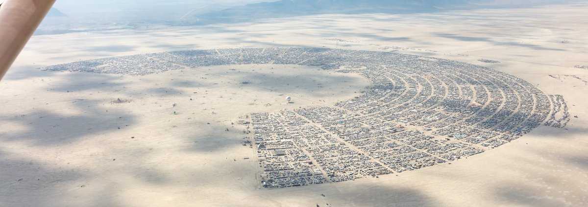 This aerial photograph of Black Rock City was shot on the morning of Friday August 31st, 2018 during Burning Man 2018. The pilot of the aircraft was Purple Haze.
