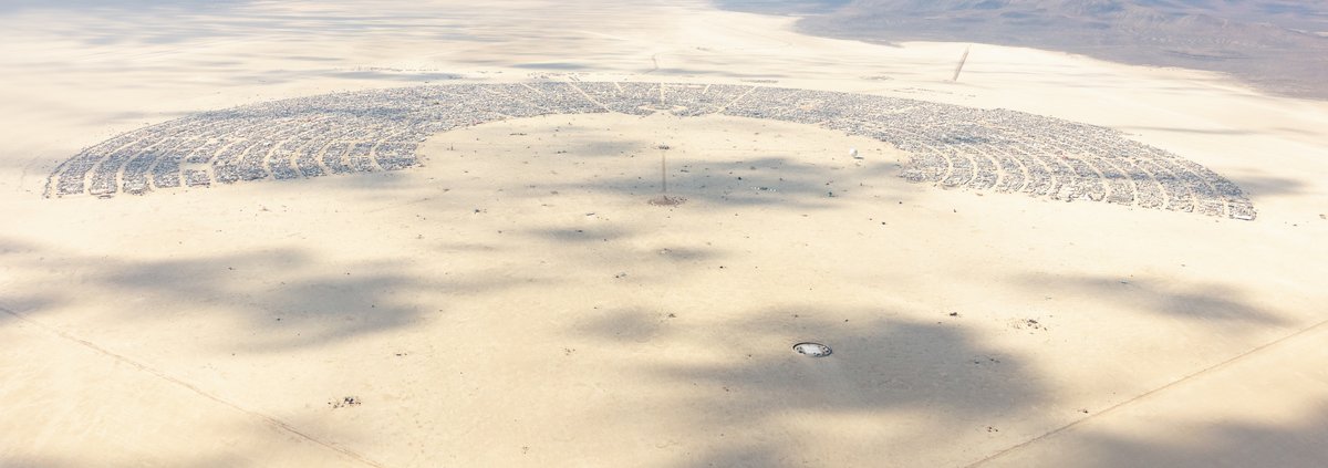 This aerial photograph of Black Rock City was shot on the morning of Friday August 31st, 2018 during Burning Man 2018. The pilot of the aircraft was Purple Haze.