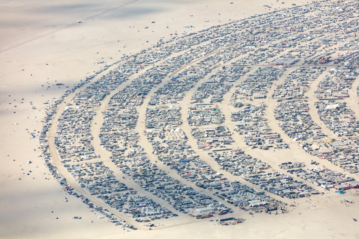 This aerial photograph of Black Rock City was shot on the morning of Friday August 31st, 2018 during Burning Man 2018. The pilot of the aircraft was Purple Haze.