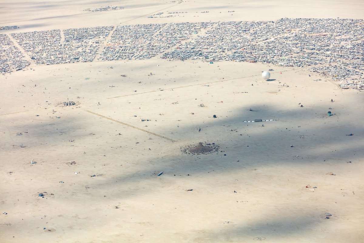 This aerial photograph of Black Rock City was shot on the morning of Friday August 31st, 2018 during Burning Man 2018. The pilot of the aircraft was Purple Haze.