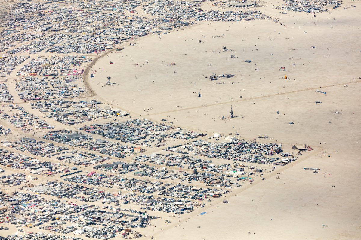 This aerial photograph of Black Rock City was shot on the morning of Friday August 31st, 2018 during Burning Man 2018. The pilot of the aircraft was Purple Haze.