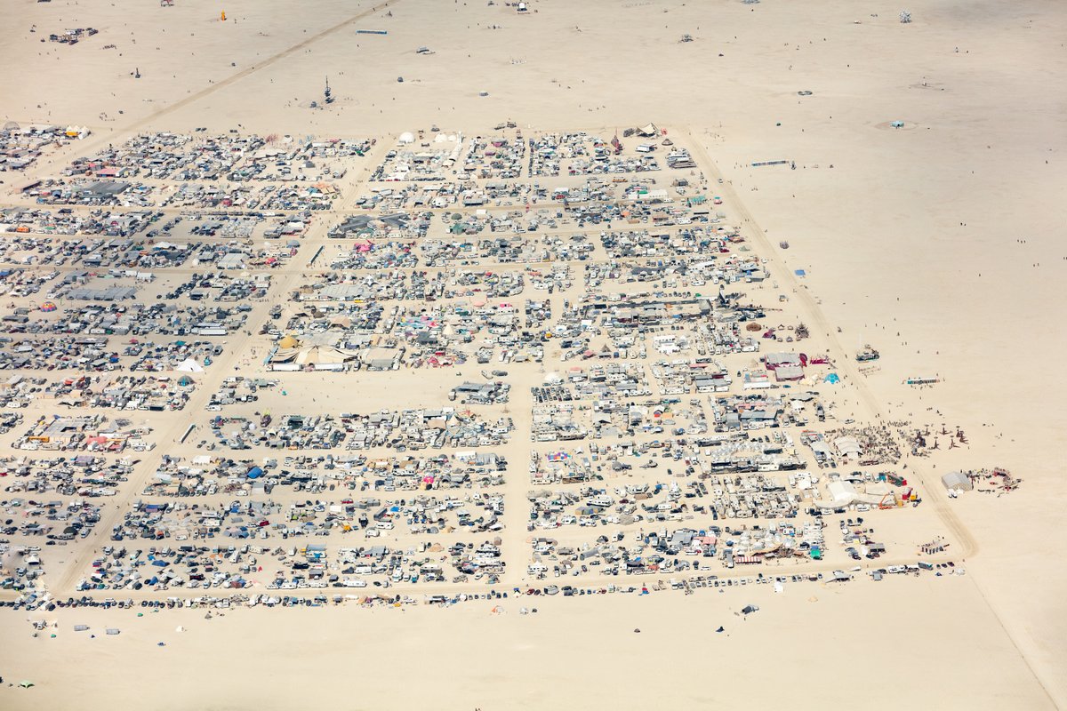 This aerial photograph of Black Rock City was shot on the morning of Friday August 31st, 2018 during Burning Man 2018. The pilot of the aircraft was Purple Haze.