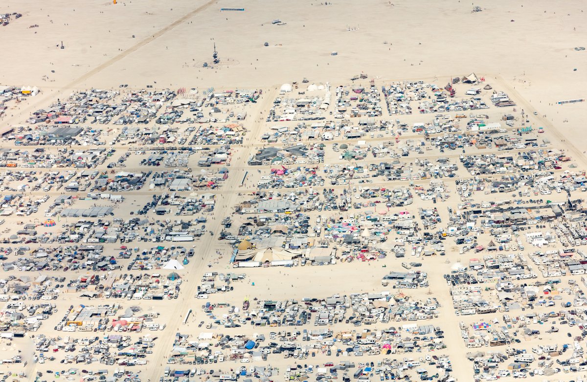 This aerial photograph of Black Rock City was shot on the morning of Friday August 31st, 2018 during Burning Man 2018. The pilot of the aircraft was Purple Haze.
