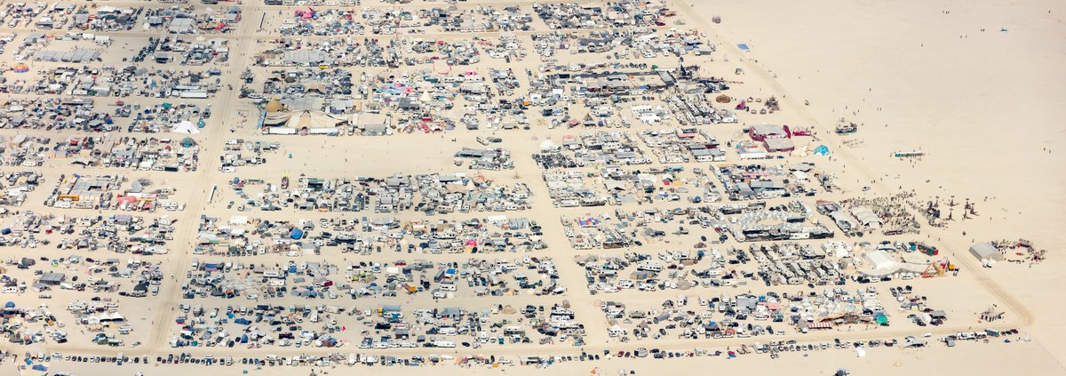This aerial photograph of Black Rock City was shot on the morning of Friday August 31st, 2018 during Burning Man 2018. The pilot of the aircraft was Purple Haze.