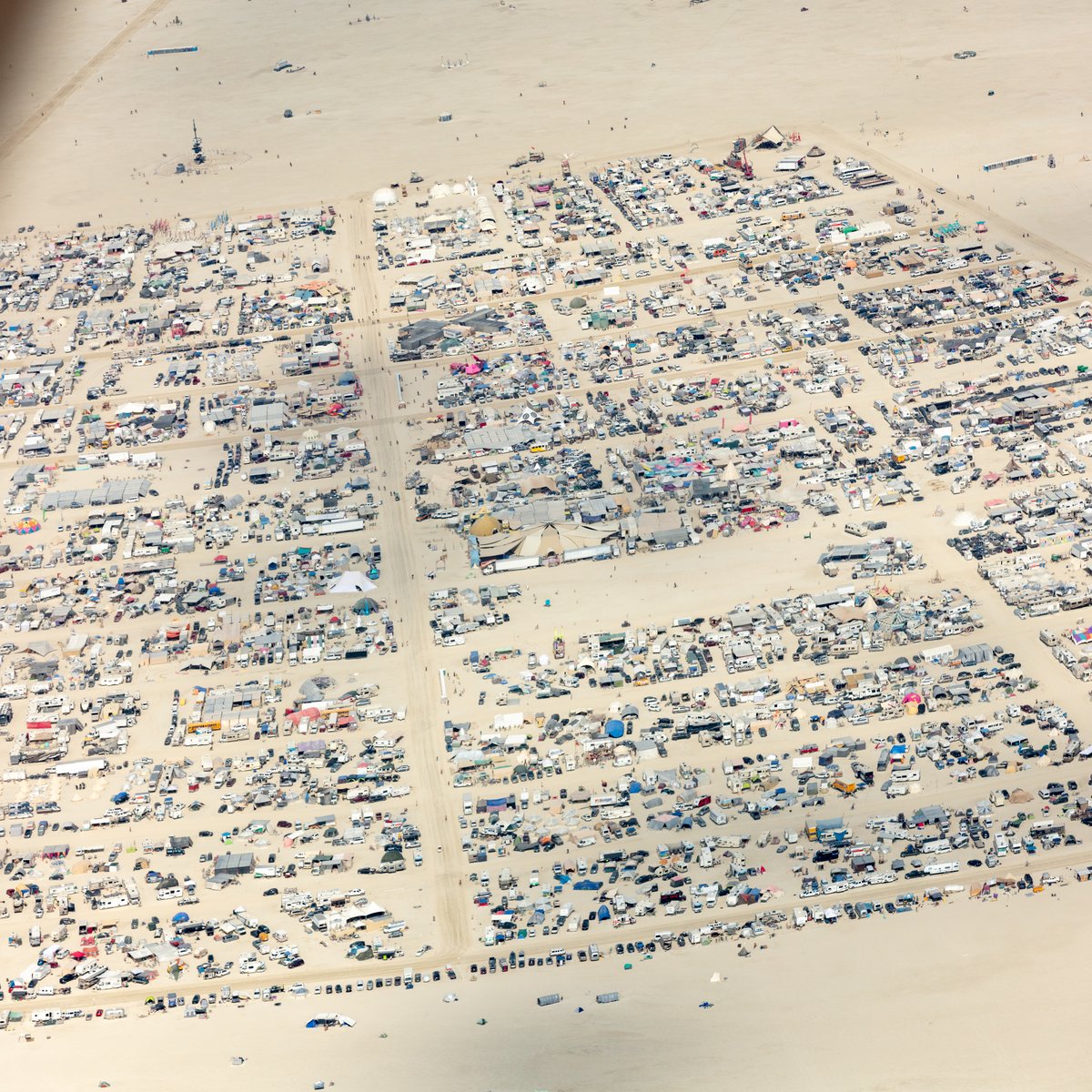 This aerial photograph of Black Rock City was shot on the morning of Friday August 31st, 2018 during Burning Man 2018. The pilot of the aircraft was Purple Haze.