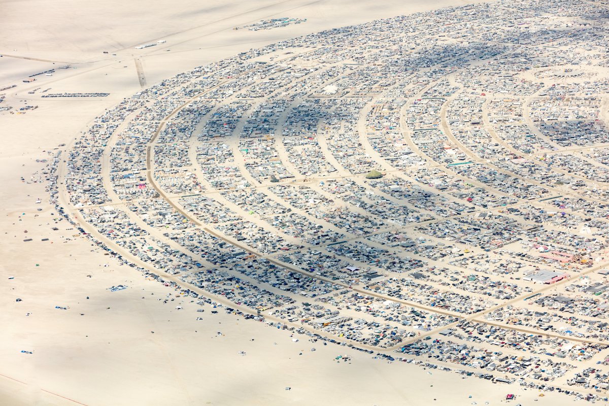 This aerial photograph of Black Rock City was shot on the morning of Friday August 31st, 2018 during Burning Man 2018. The pilot of the aircraft was Purple Haze.