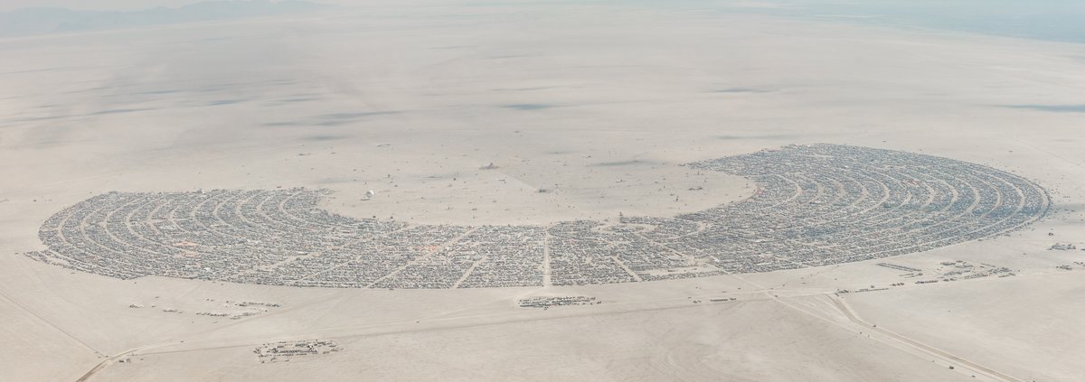 This aerial photograph of Black Rock City was shot on the morning of Friday August 31st, 2018 during Burning Man 2018. The pilot of the aircraft was Purple Haze.