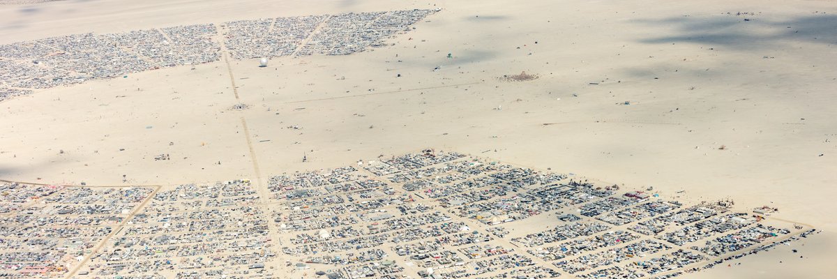 This aerial photograph of Black Rock City was shot on the morning of Friday August 31st, 2018 during Burning Man 2018. The pilot of the aircraft was Purple Haze.