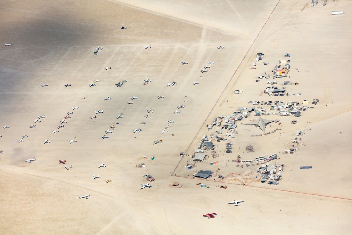 This aerial photograph of Black Rock City was shot on the morning of Friday August 31st, 2018 during Burning Man 2018. The pilot of the aircraft was Purple Haze.