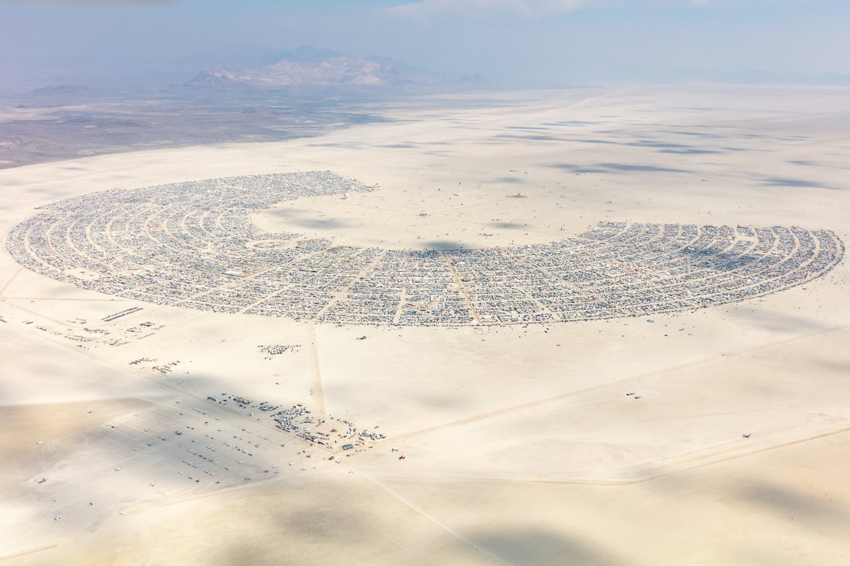 This aerial photograph of Black Rock City was shot on the morning of Friday August 31st, 2018 during Burning Man 2018. The pilot of the aircraft was Purple Haze.