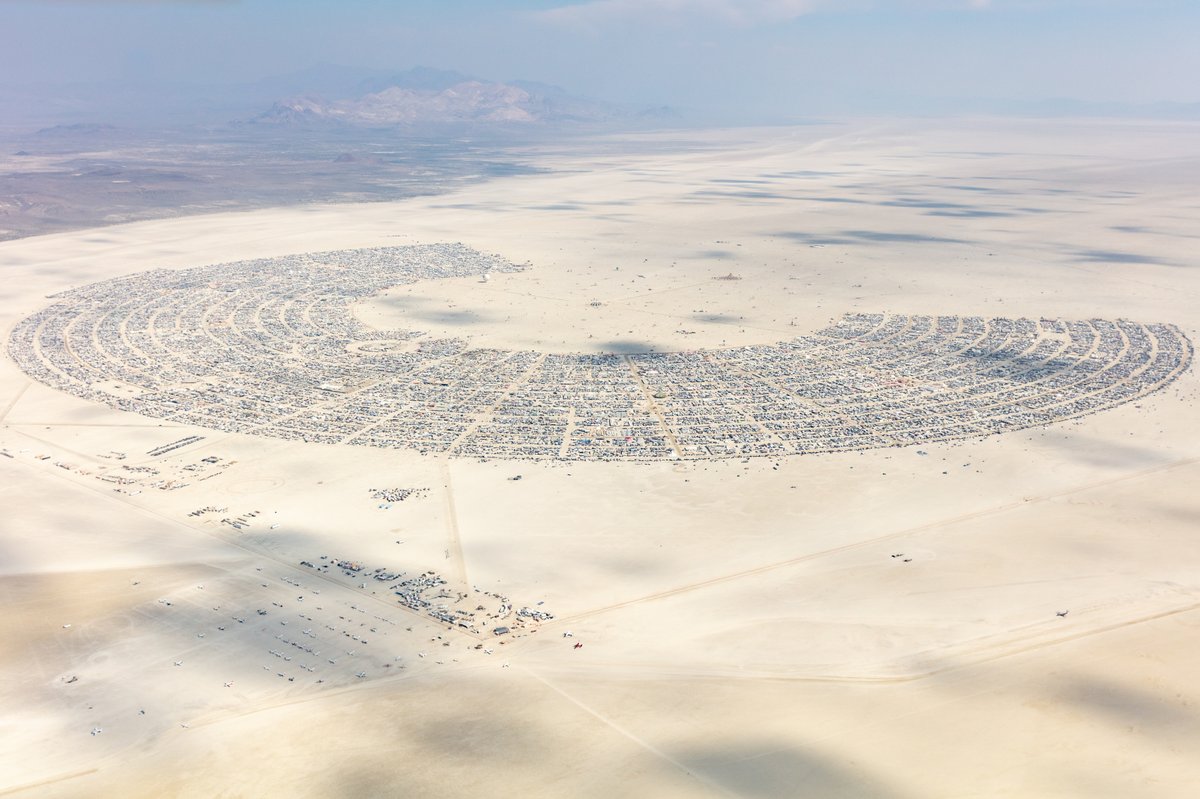 This aerial photograph of Black Rock City was shot on the morning of Friday August 31st, 2018 during Burning Man 2018. The pilot of the aircraft was Purple Haze.