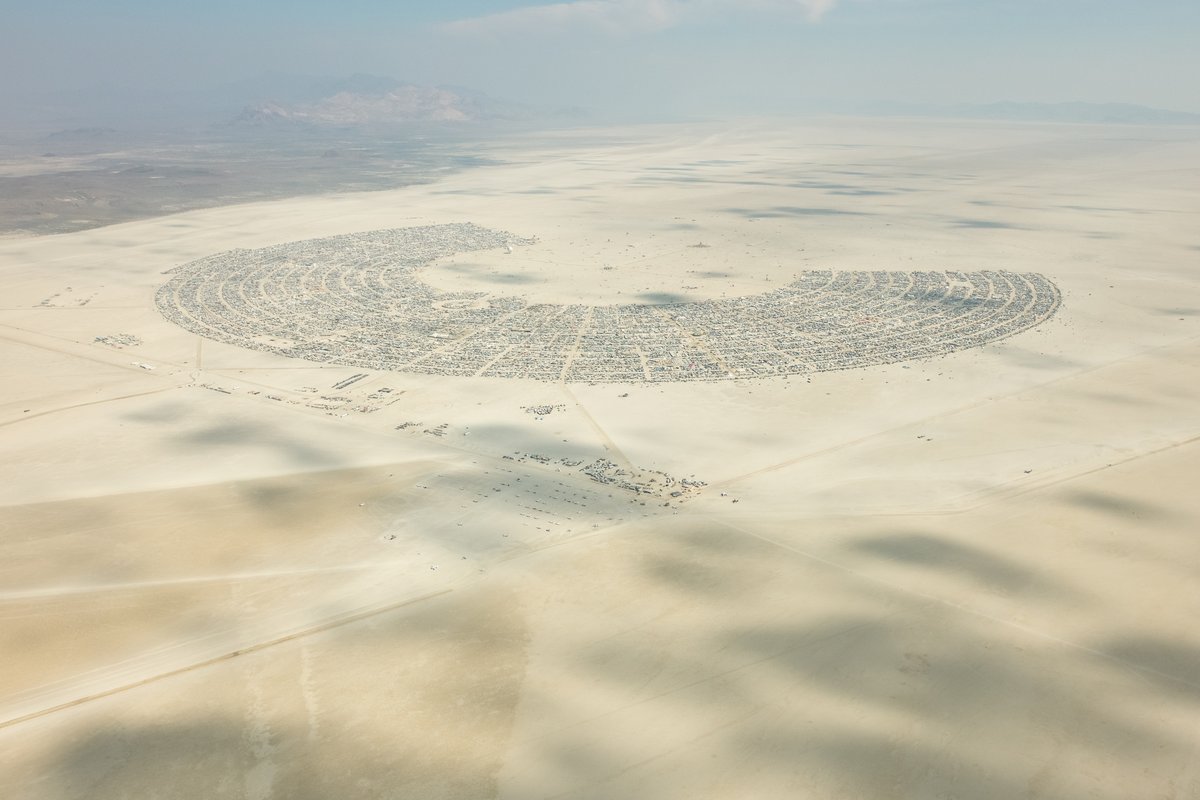 This aerial photograph of Black Rock City was shot on the morning of Friday August 31st, 2018 during Burning Man 2018. The pilot of the aircraft was Purple Haze.