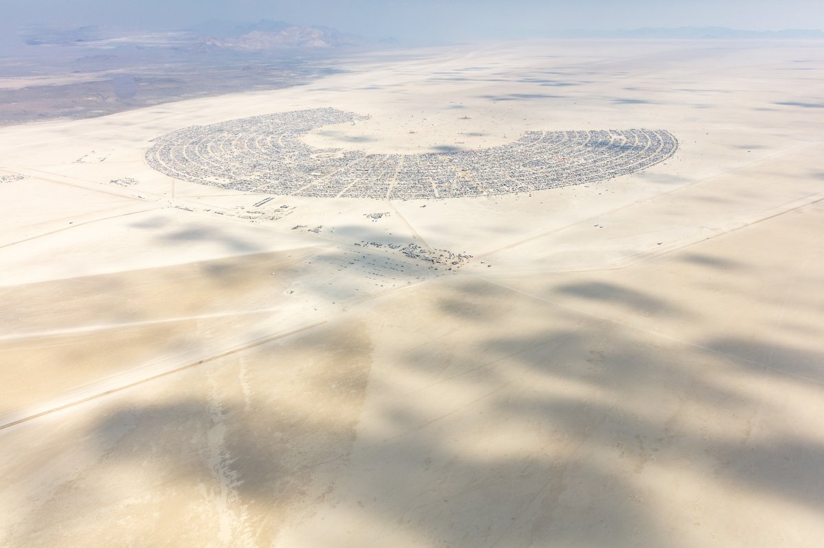 This aerial photograph of Black Rock City was shot on the morning of Friday August 31st, 2018 during Burning Man 2018. The pilot of the aircraft was Purple Haze.