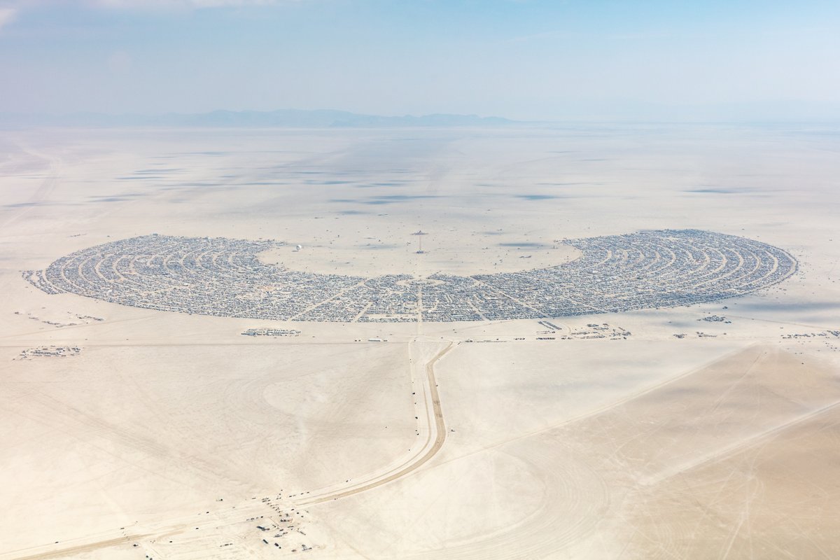 This aerial photograph of Black Rock City was shot on the morning of Friday August 31st, 2018 during Burning Man 2018. The pilot of the aircraft was Purple Haze.