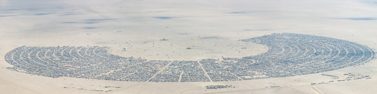 This aerial photograph of Black Rock City was shot on the morning of Friday August 31st, 2018 during Burning Man 2018. The pilot of the aircraft was Purple Haze. This image is about 135 Megapixels.