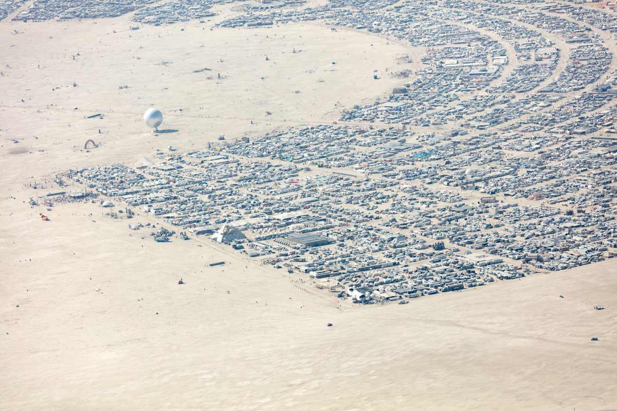 This aerial photograph of Black Rock City was shot on the morning of Friday August 31st, 2018 during Burning Man 2018. The pilot of the aircraft was Purple Haze.