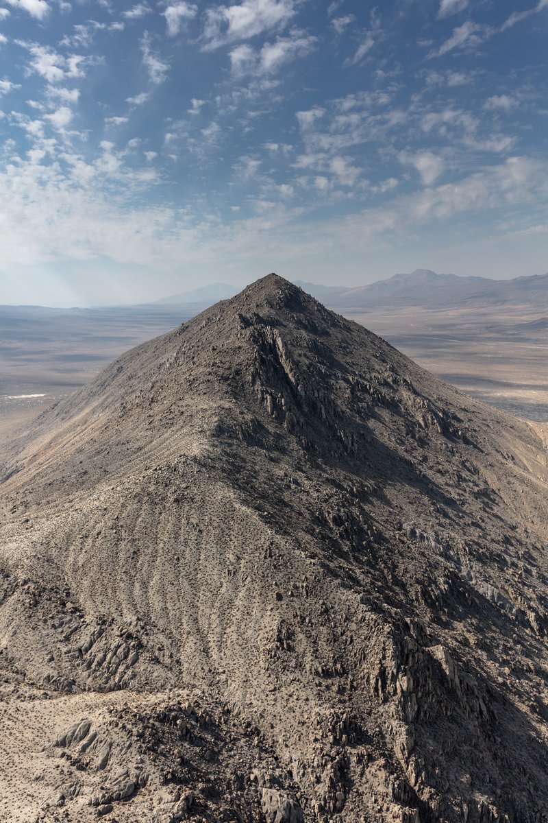 Some pilots like to play around here by swooping and diving so close to the moutain you feel like you can touch it.