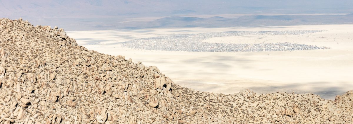 This aerial photograph of Black Rock City was shot on the morning of Friday August 31st, 2018 during Burning Man 2018. The pilot of the aircraft was Purple Haze.