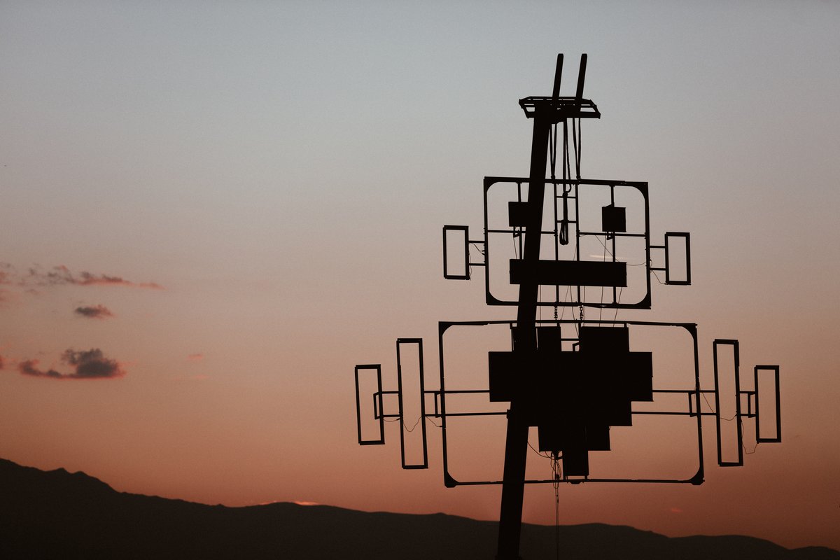 The Robot Heart logo and the sky after sunset.