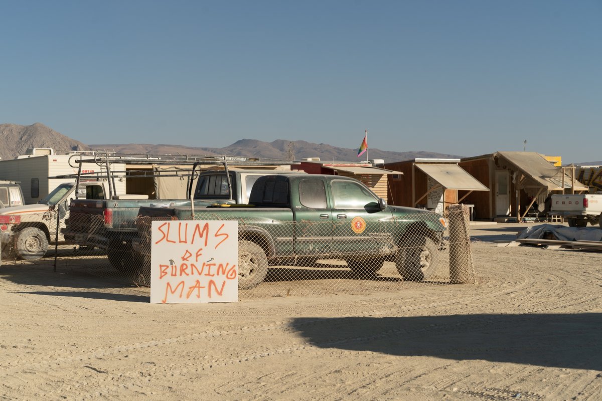 Those structures don't look like slums to me. They look luxrious compared to some small tents.