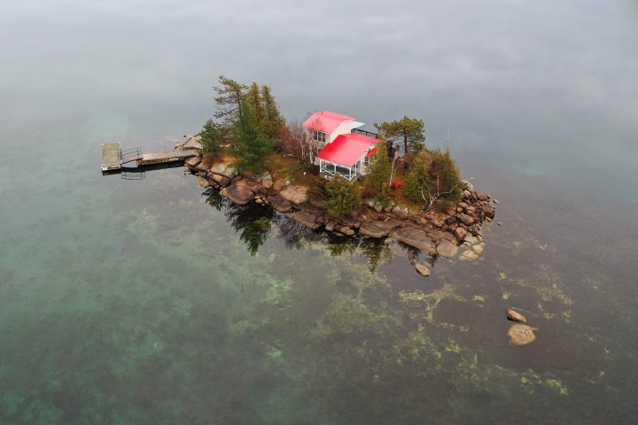 Cottage with Red Roof on Small Island