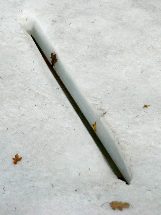 metal bar melting into the ice