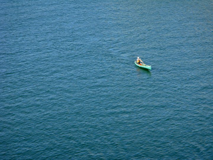 Man Solo Canoeing