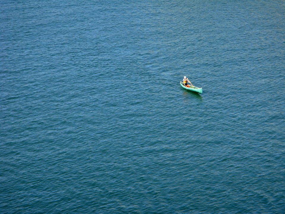 Man Solo Canoeing