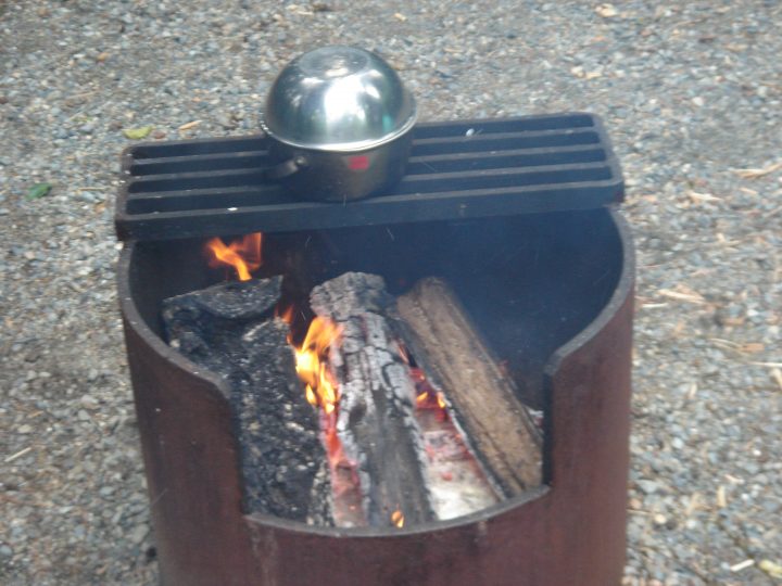 cooking in the open fire
