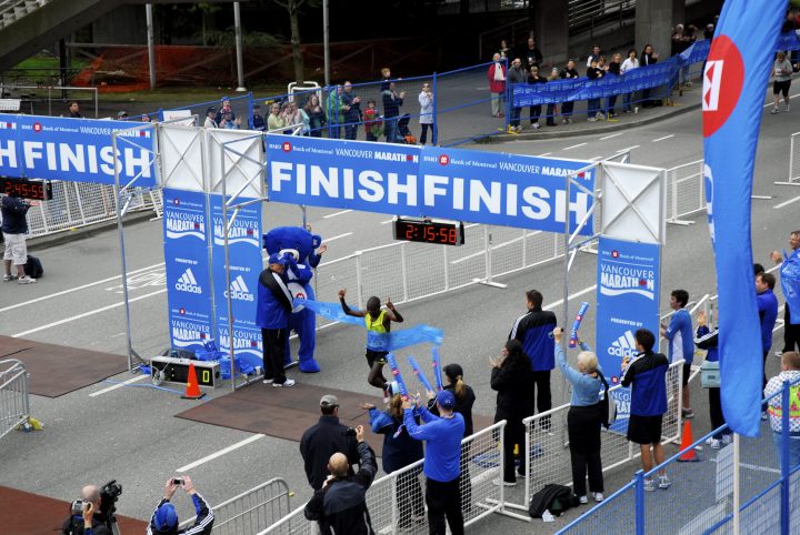 Thomas Omwenga wins the Vancouver Marathon