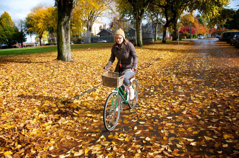 Dorothy Biking Through Leaves