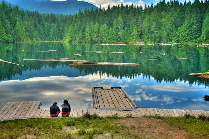 Two Women Sitting Beside Alice Lake Peace and Quiet