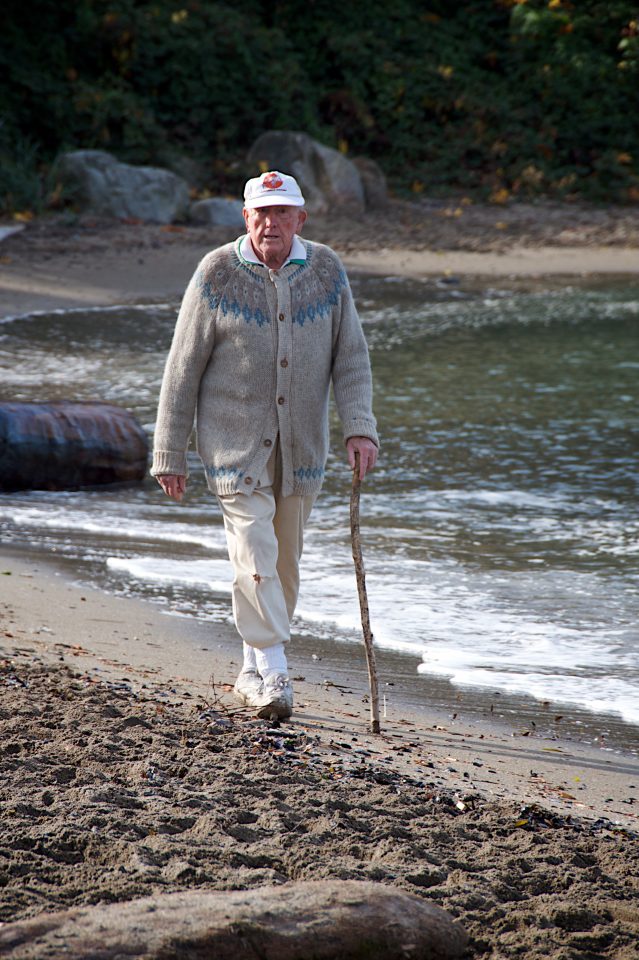 Old Man Walking on the Beach