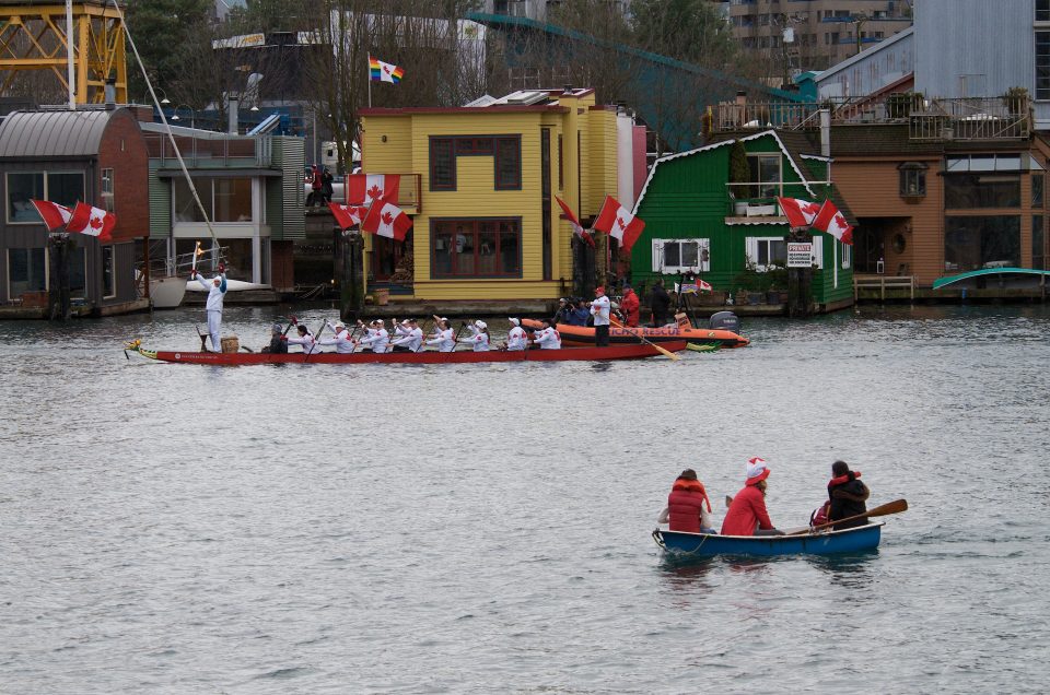 The Torch passes Floating Houses on Granville Island