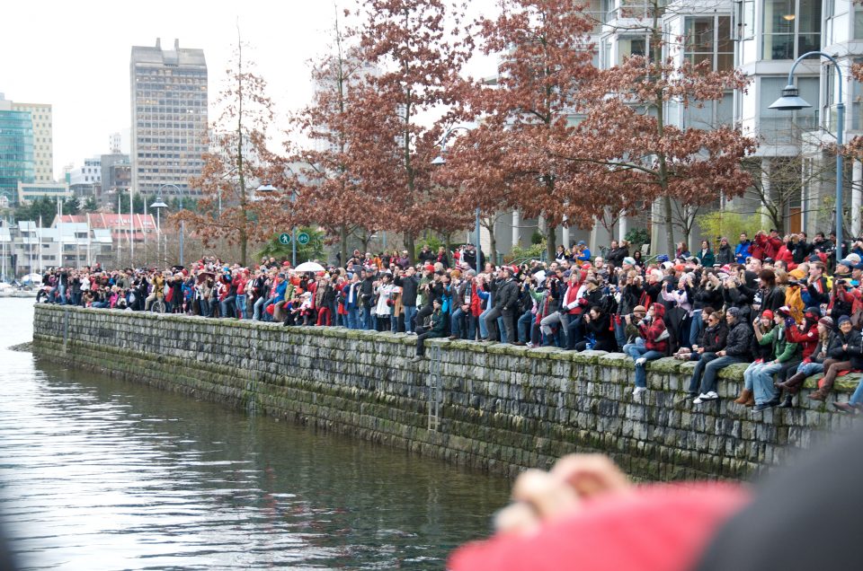 Crowd Watches the Olympic Torch Arrive at Yaletown