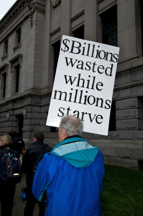 “Billions Wasted While Millions Starve”