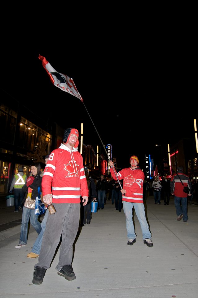 Team Canada Fans Fly Flag