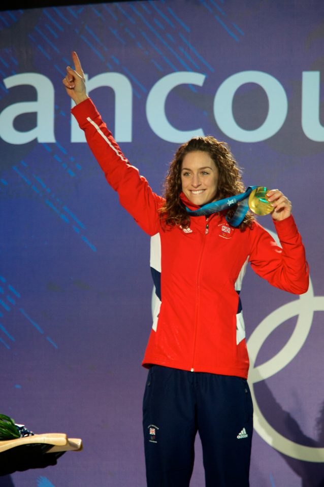 Amy Williams Holding Gold Medal